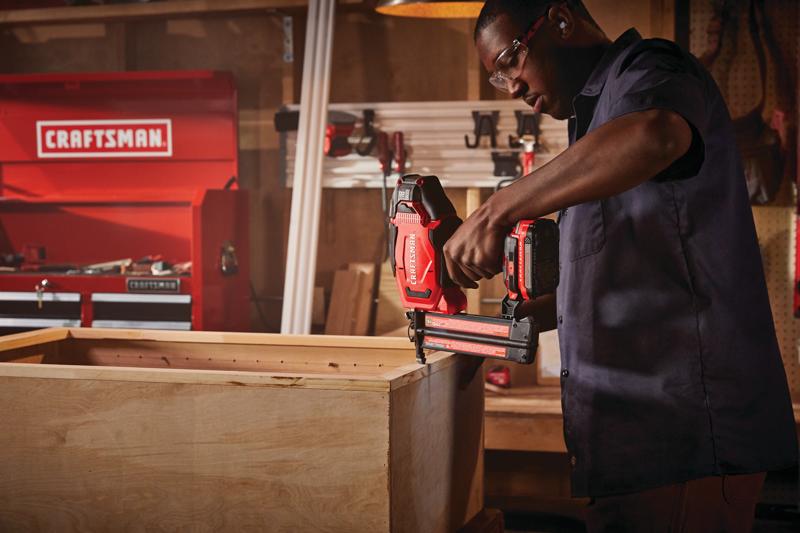 20 volt 18 gauge cordless brad nailer kit being used by a person indoors.
