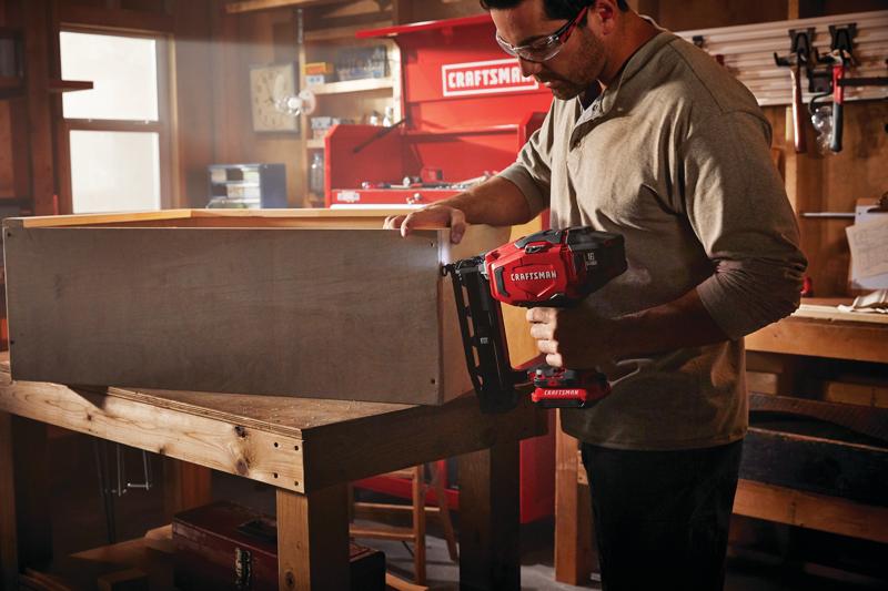 Cordless 16 gauge finish nailer kit 1 battery being used for makig wooden box.